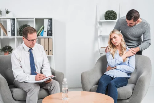 A therapist meeting with a couple